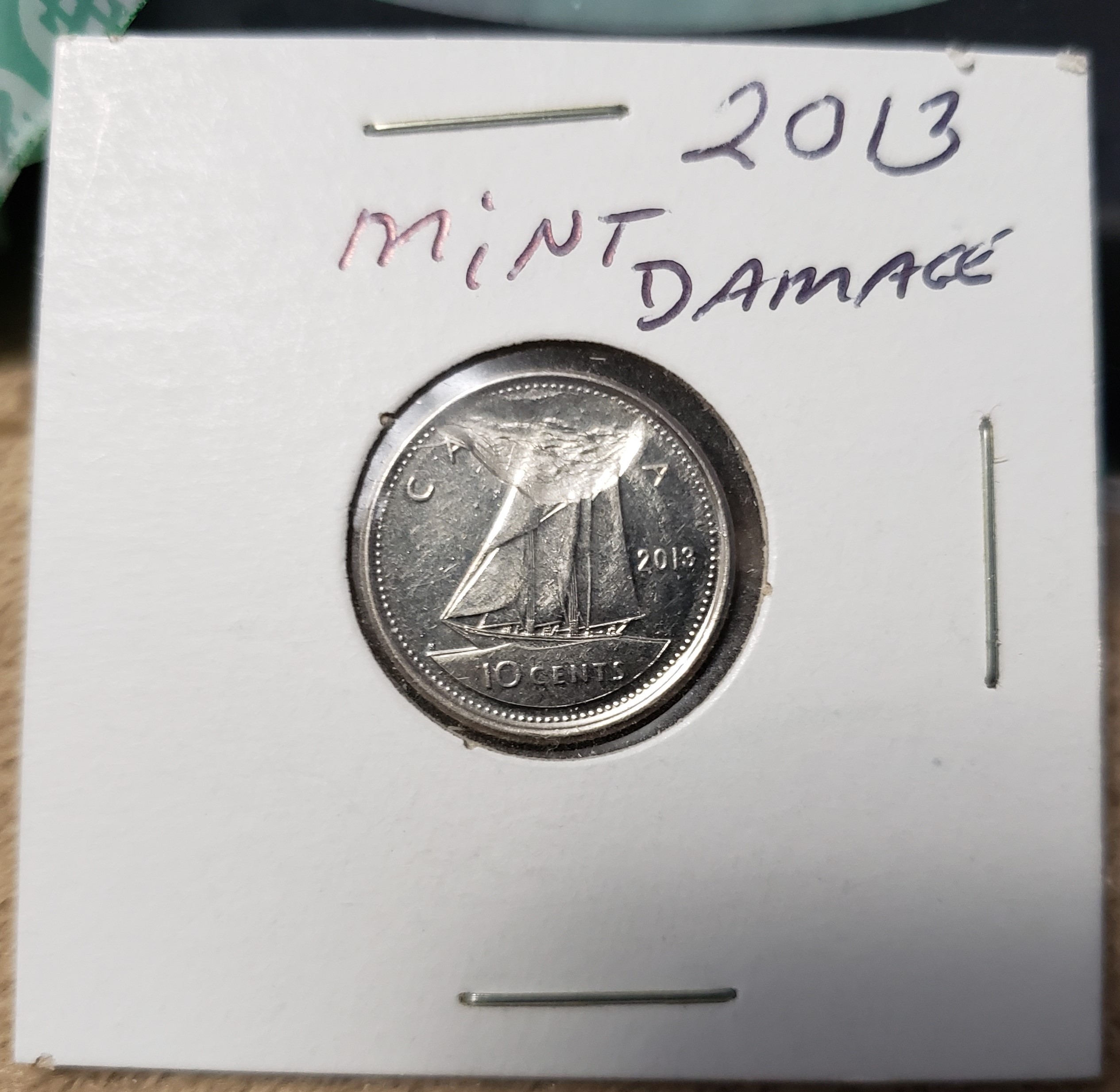 Dime - mint damage.jpg